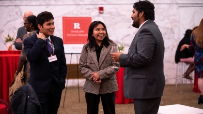 three people talking to each other